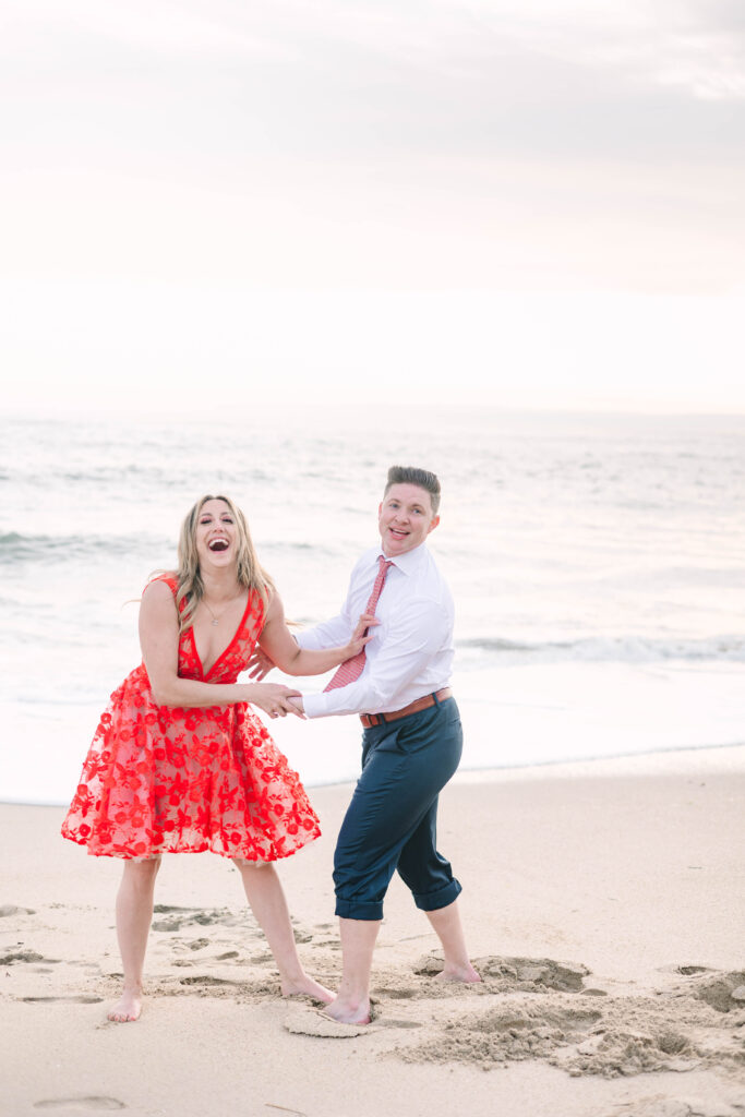 Bay Area wedding photographers capture couple playing in beach