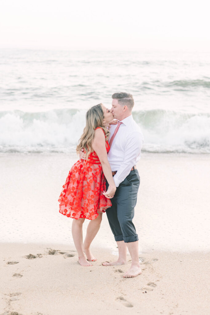 Bay Area wedding photographers capture man and woman holding hands by the beach after surprise proposal