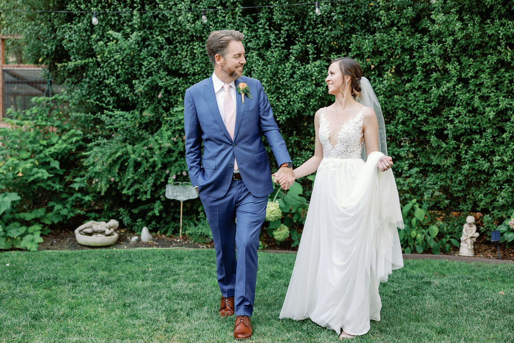 Bay Area wedding photographer captures bride and groom walking hand in hand 