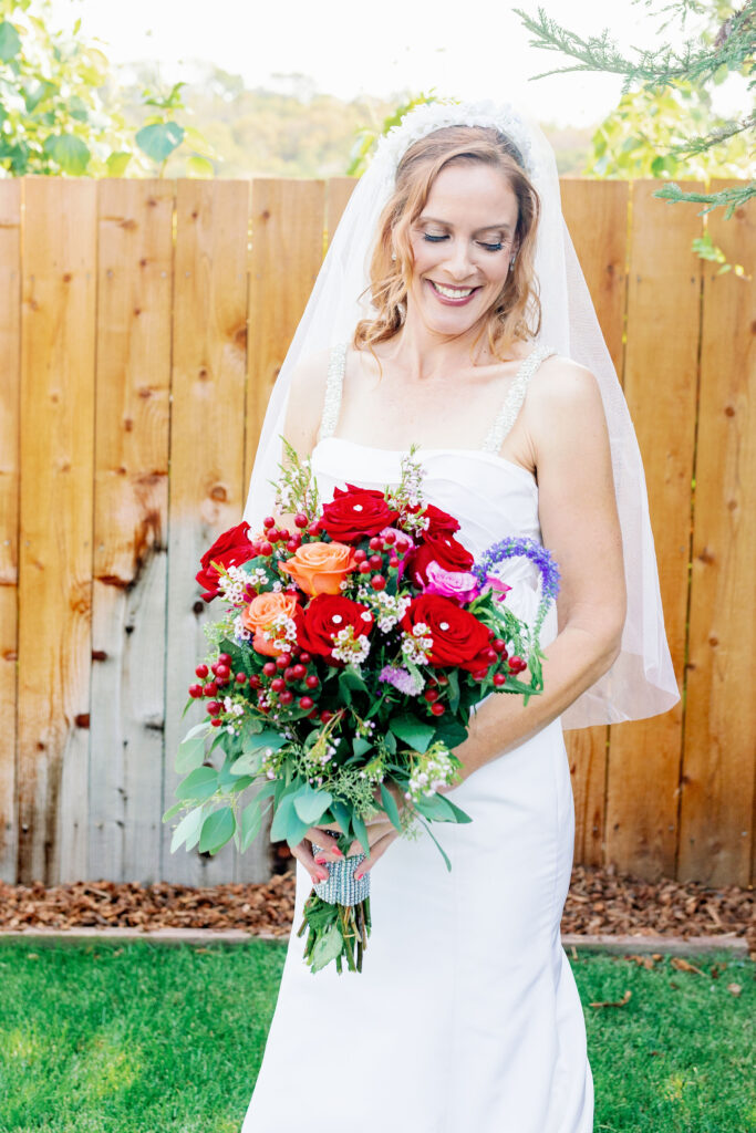 Bay Area wedding photographer captures bride and groom holding bouquet 