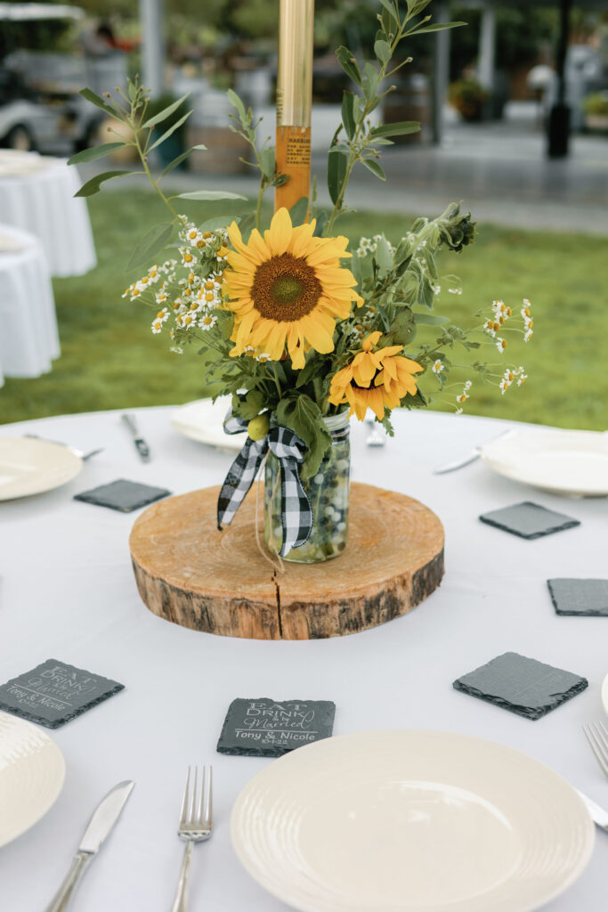 Bay Area wedding photographer captures sunflower centerpieces at outdoor wedding 