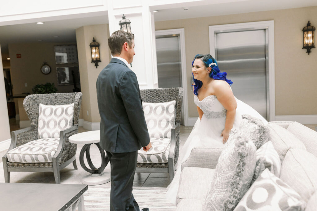 Bay Area photographers capture bride laughing seeing groom for first tim