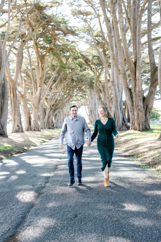 Bay Area wedding photographer captures couple walking through Cypress Tree Tunnel
