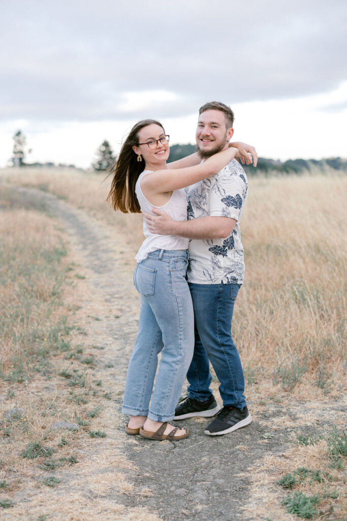 Bay Area wedding photographer captures couple dancing in field