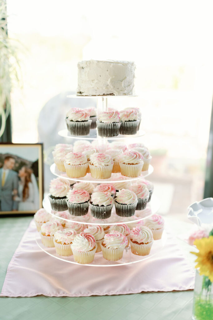 Bay area wedding photographer photographs cupcakes on a tower at wedding reception