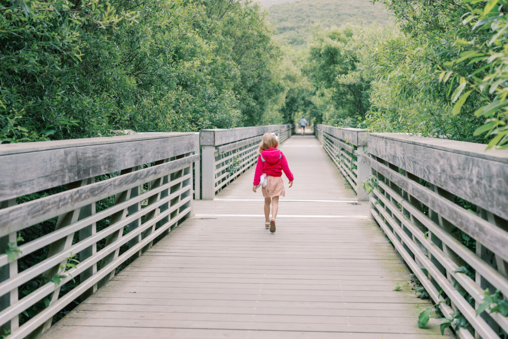 Bay Area wedding photographer captures girl walking on bridge