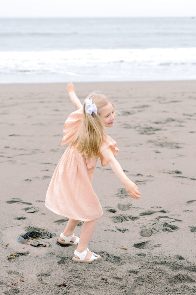 Bay Area wedding photographer captures girl playing in sand