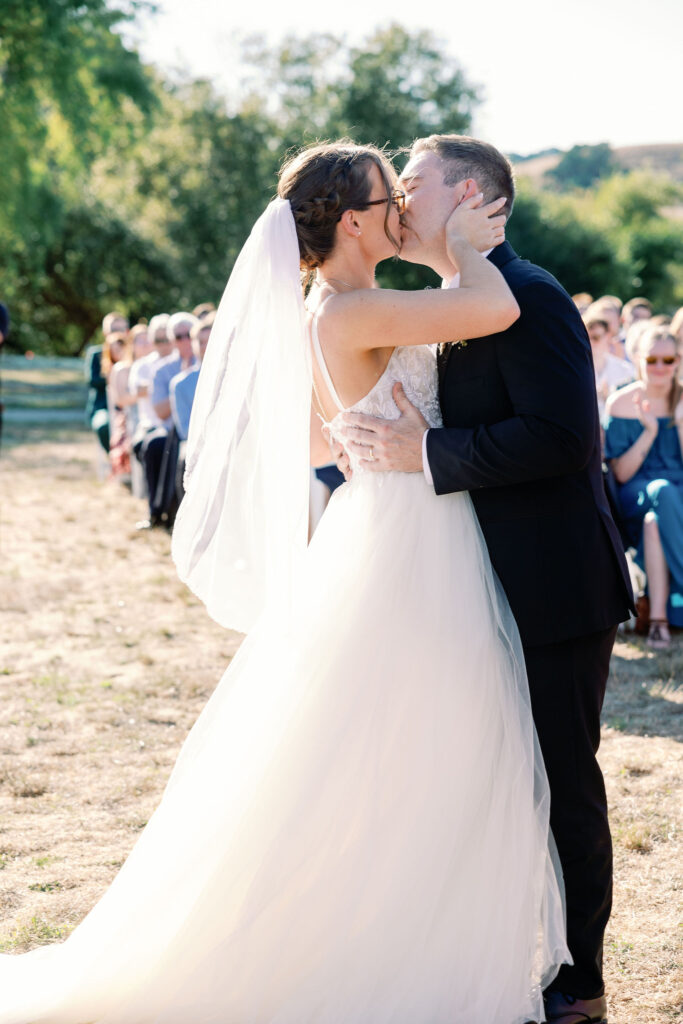 Bay Area wedding photographer captures bride and groom kissing