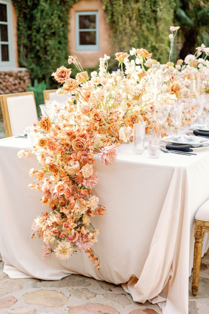 Bay Area wedding photographer captures wedding centerpiece of flowers hanging down from center to floor