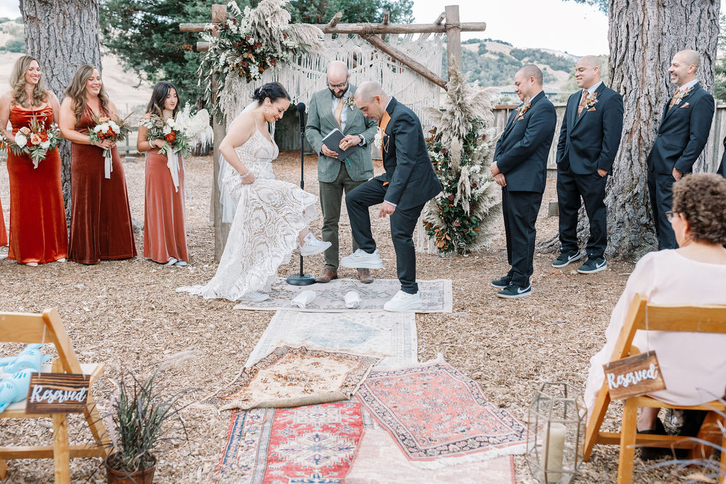 Bay Area wedding photographer captures bride and groom stomping on glass