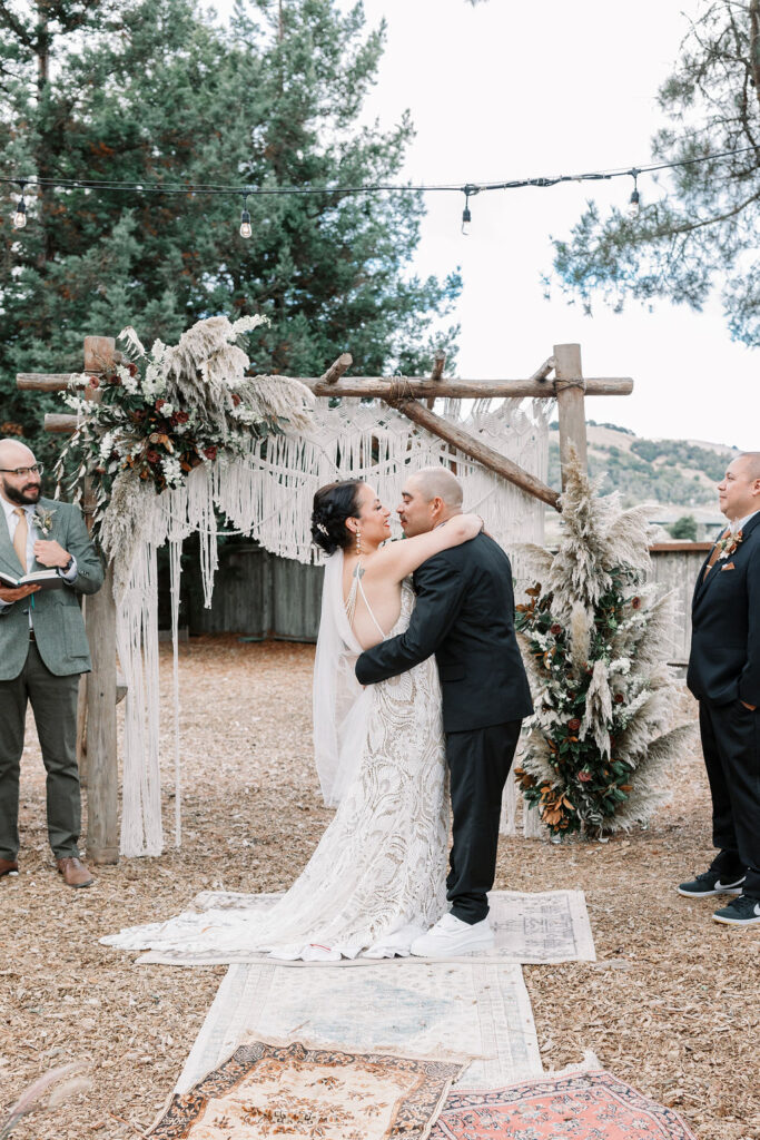 Bay Area wedding photographer captures bride and groom kissing after Rancho Nicasio wedding