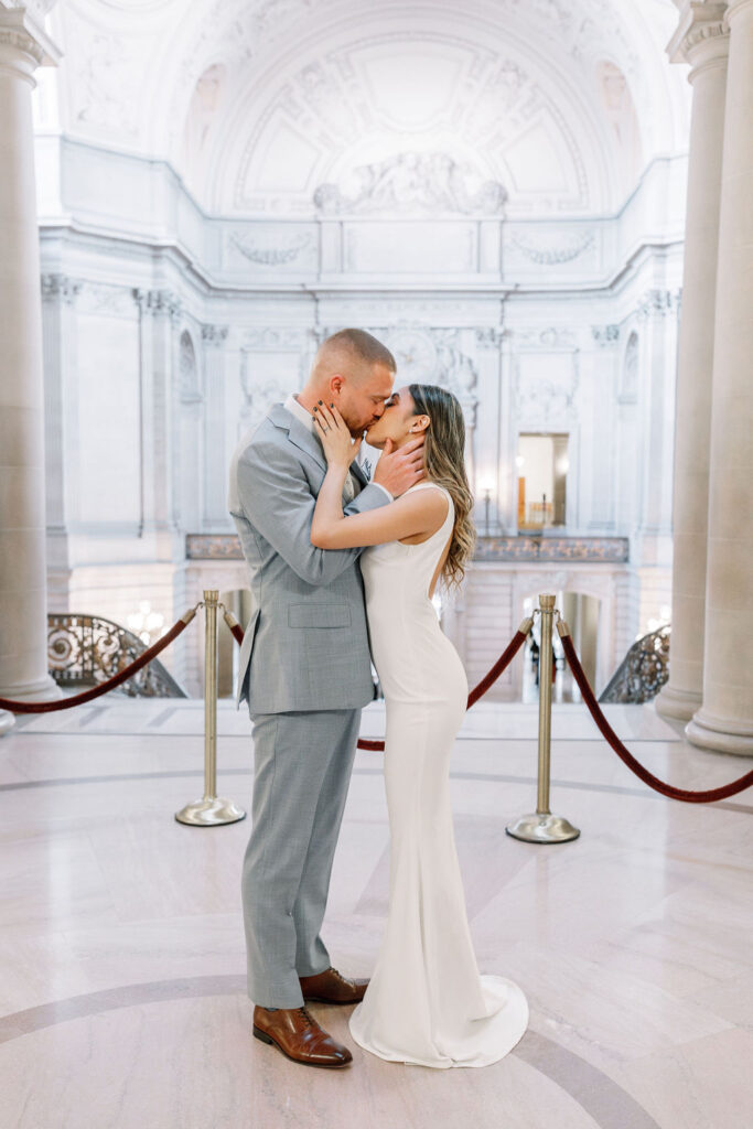 Bay Area wedding photographer captures bride and groom kissing 
