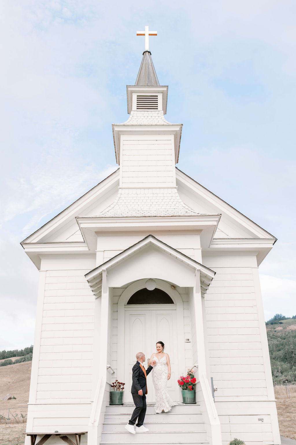 Bay Area wedding photographer captures bride and groom outside of chapel at Rancho Nicasio Wedding